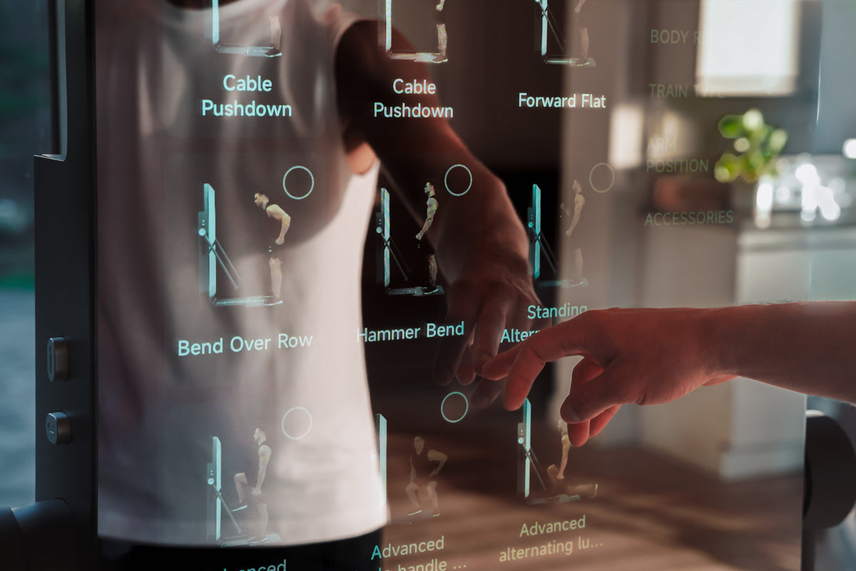 Person using IMBODY Power S in a bright modern home, demonstrating a long-term wellness-focused strength training routine