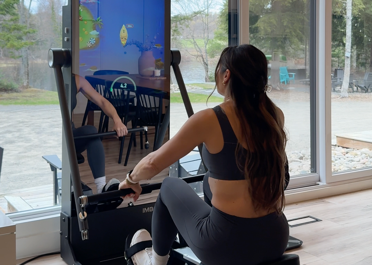 IMBODY Power S smart home gym setup with rowing chair package in a modern living space